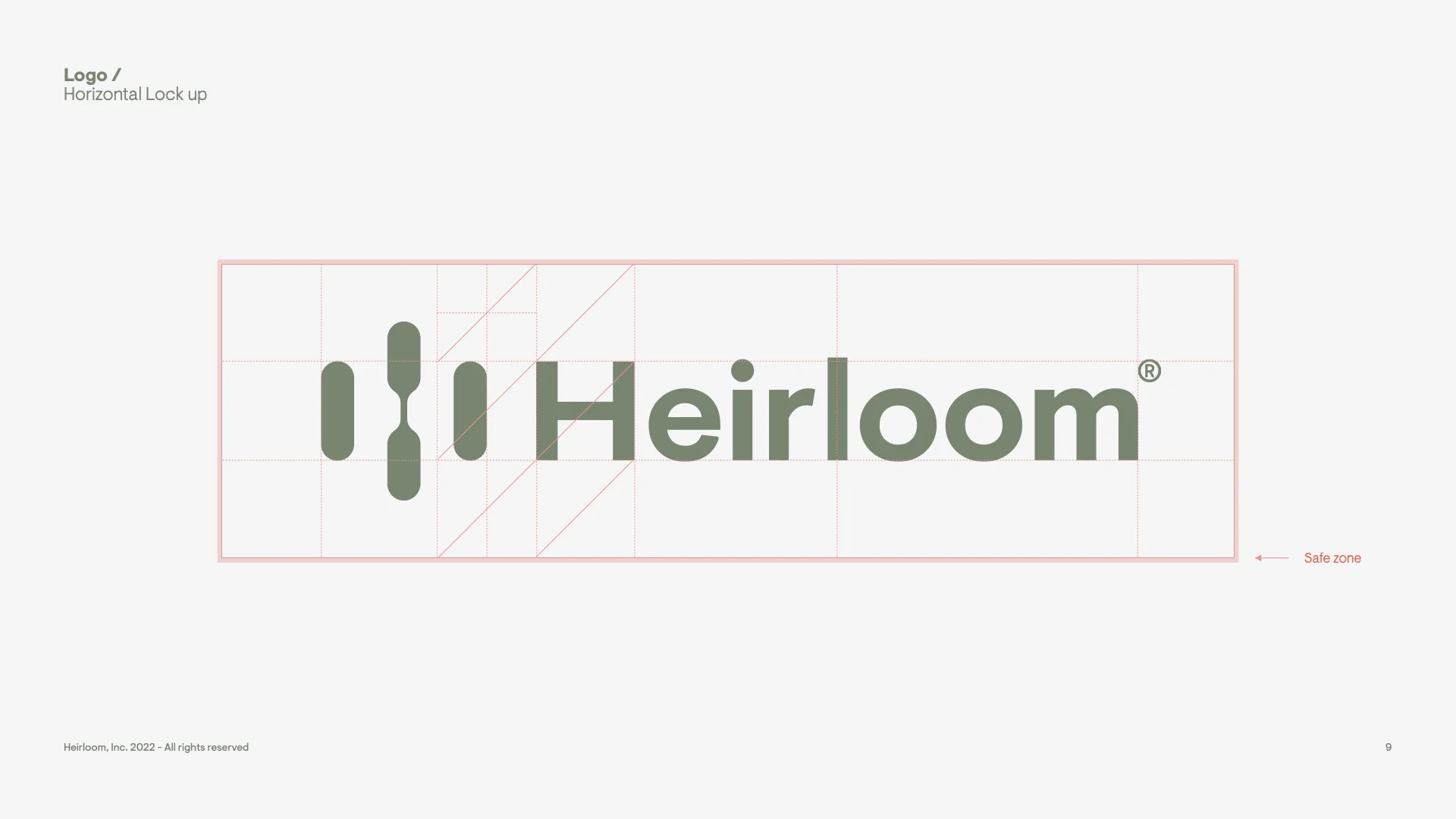 Heirloom logo horizontal lockup on a construction grid with safe zone markings, from the brand guidelines